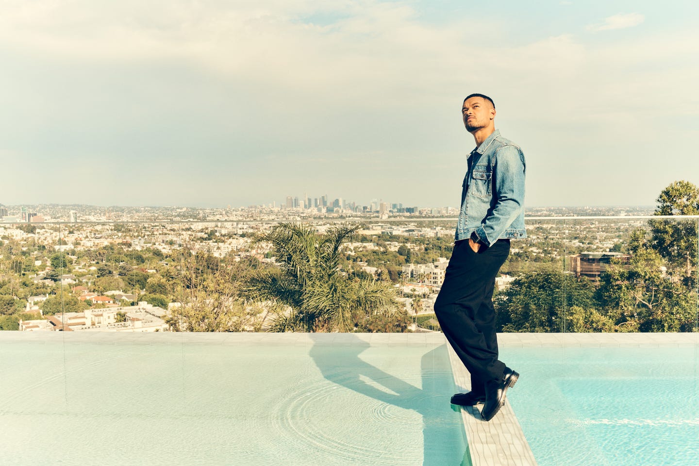 Steven Bartlett by the zero-edge pool at his rented LA house